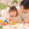 2歳・3歳の子どもがお父さんと積み木や絵カードで遊ぶ様子